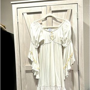 Size small Lucy Love Babydoll dress. New without tag. 100% Rayon.